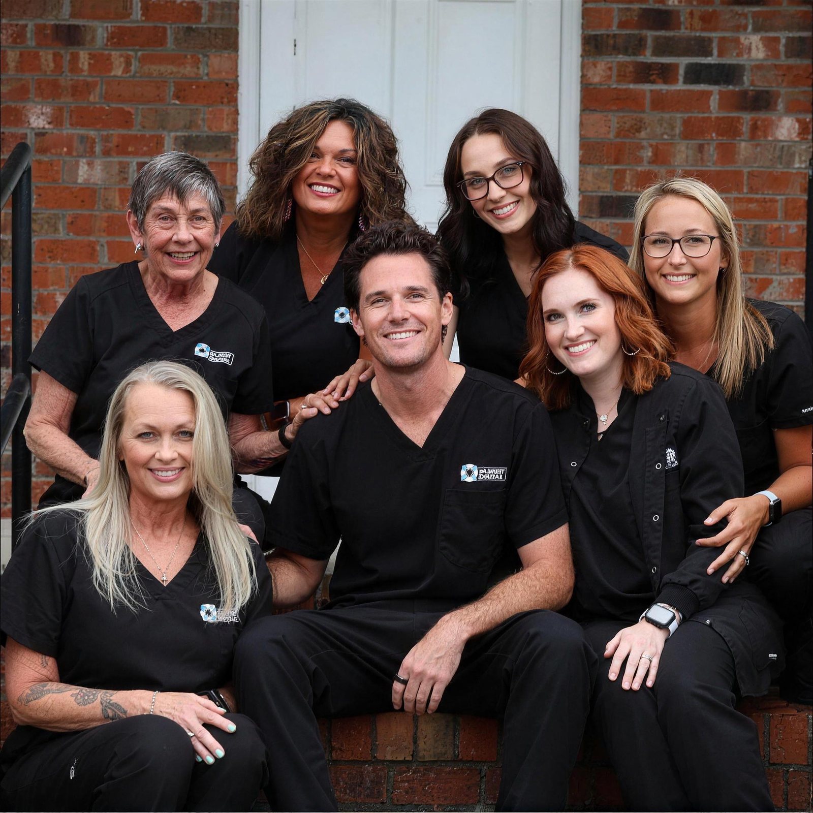 Dr. Wes Parker and the Parker Dental team on the steps of the office